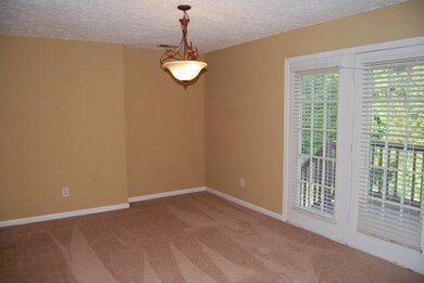 Dining room with double doors to deck
