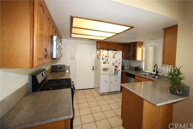 Kitchen with granite counter top and stainless ste