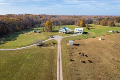 A privacy barrier of trees surrounds the
home cre