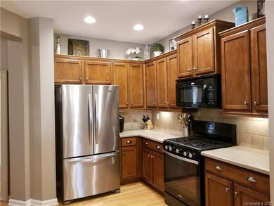 Gas range, corian counters, back splash, spacious 