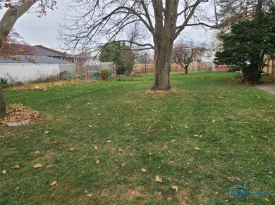 Large garden area in corner.