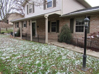 New front porch and sidewalk.