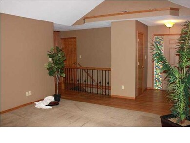 View from Fireplace to Basement Stairwell and Foye