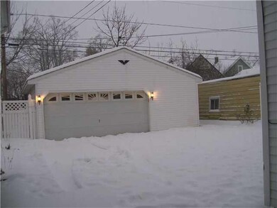 Parking Lot/Garage. 2.5 car garage..concrete drive
