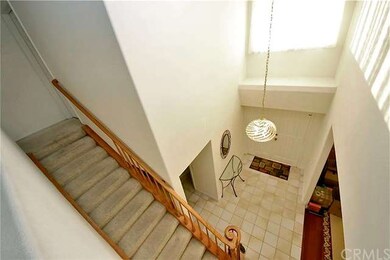 Dramatic 2-story ceiling over the formal entryway