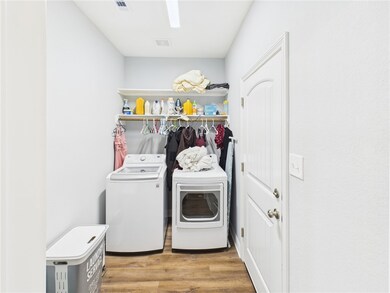 Laundry room featuring independent washer and drye