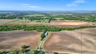 View of rural area featuring property boundaries highlighted and large plots for crops