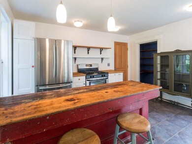 The kitchen island is an antique...