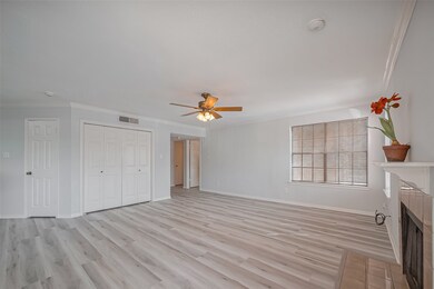 Spacious Living Room Features New Gray Laminate Fl