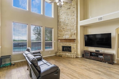 Beautiful Floor to Ceiling Fireplace.
