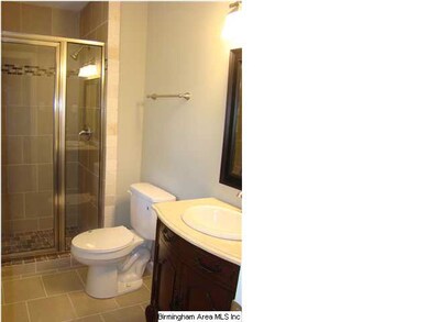 Master bath has new tile floor and shower.