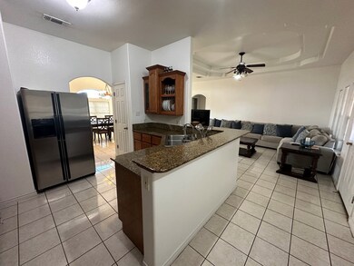 Kitchen w/Island & Living View