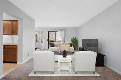 Shows living room virtually staged