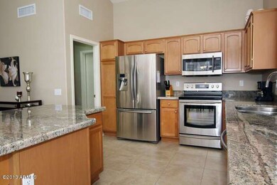 Kitchen w Granite, SS and Maple cabinets