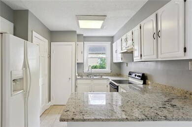 The lovely kitchen has a pantry too!