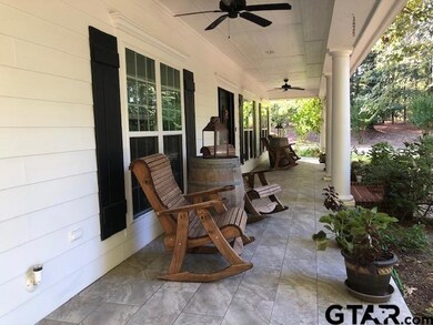 Front porch gives home a true Southern charm. Rock