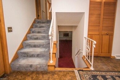 Upstairs on the left and downstairs family room on