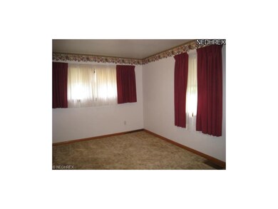 Bedroom 3 on the 1st floor with hardwood floors un