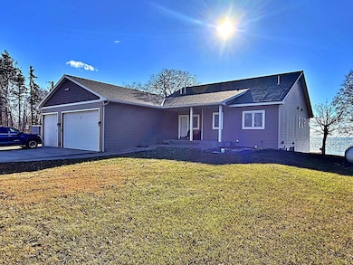 Main view of main home with Lake in the distance.jpg