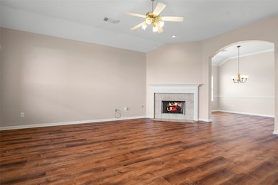 Open floor plan with new flooring and paint in the