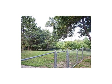 HUGE fenced front yard