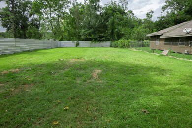 9305 Sherbourne St, Houston, TX 77016 - photo 7