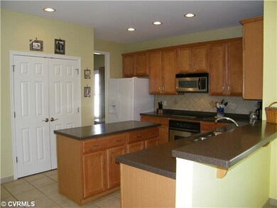 Kitchen - (18X13) Features Corian Counters, Maple 