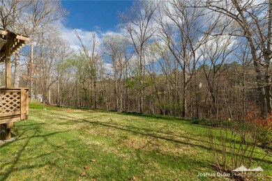 The back yard has a fabulous view of common property behind.