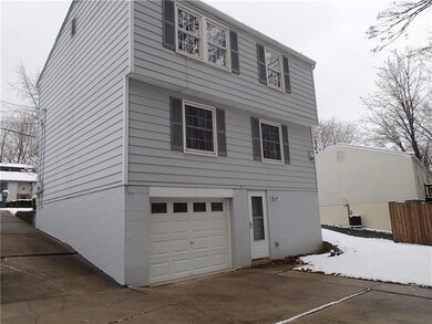 Rear view of the home, with walk out basement.