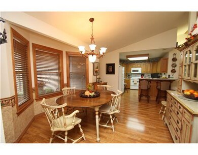 Dining Room. Huge open dining area with bayed window, hardwoods and vaulted ceiling!