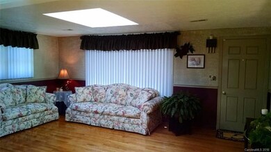 LIVING ROOM WITH SKY LIGHT