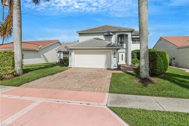 View of front of property with a garage and a fron