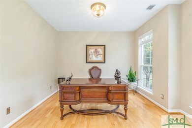 Office or formal living room opposite dining room