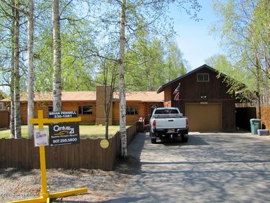Charming log cabin w/detached garage.