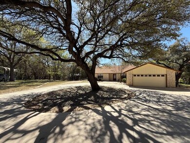 View of front of house featuring driveway and an 