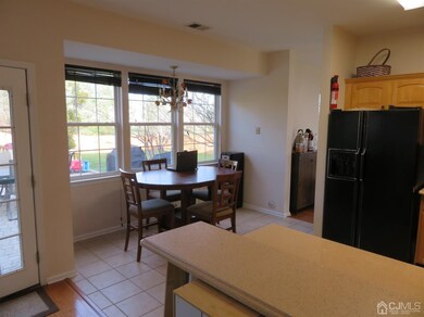 Eat-in kitchen overlooks the spacious backyard