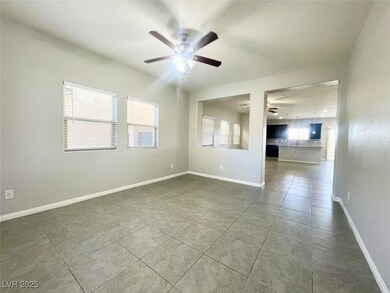 Unfurnished room with dark tile patterned flooring