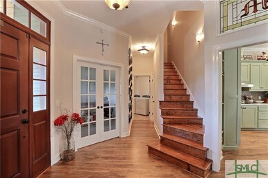 Foyer Entry- French Doors lead to Office/Study