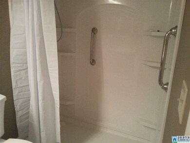 HAS HUGE WALKIN SHOWER.  GREAT HANDICAP FEATURES.