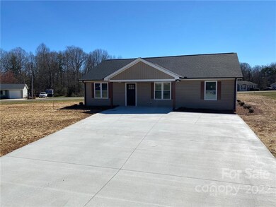 These photos are of a home in the same neighborhood  across the street from where 187 Delight Loop will be built. The floor plan and the quality will be very similar except for the addition of that 2 car garage.