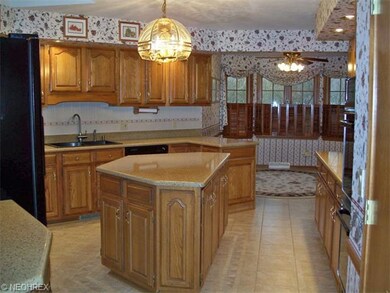 Gourmet kitchen featuring granite, ceramic, gas co