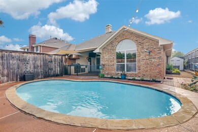 Single story home with a front yard