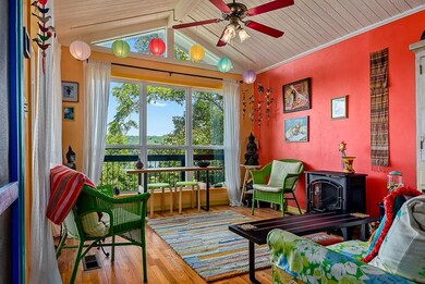 Front room, with a propane fireplace/stove.