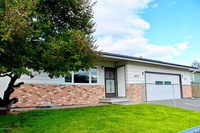 Fenced front and back yards