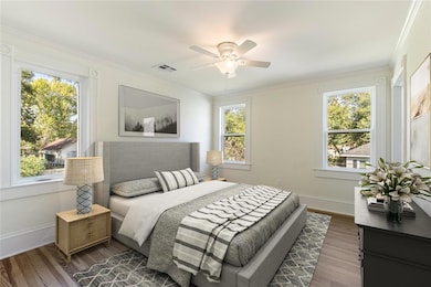 Large primary bedroom is one of 5 bedrooms in the home