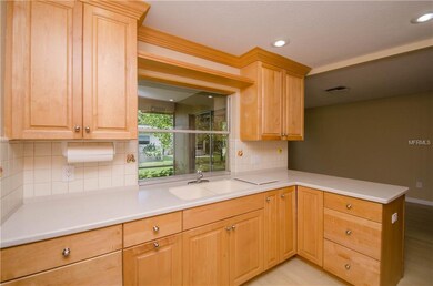 Remodeled Kitchen with Solid Surface Counters.