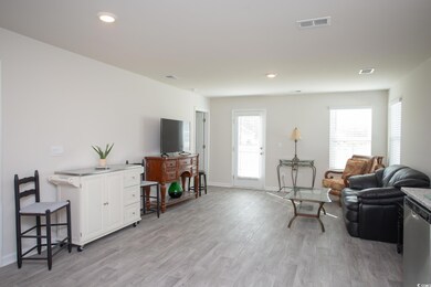 Living room featuring light hardwood / wood-style flooring