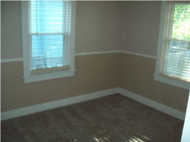 Guest bedroom on main level has new carpet!