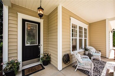 Roomy Front porch. Current owners love to sit outs