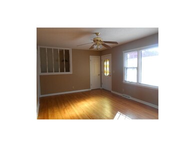 Living room looking to the front door.